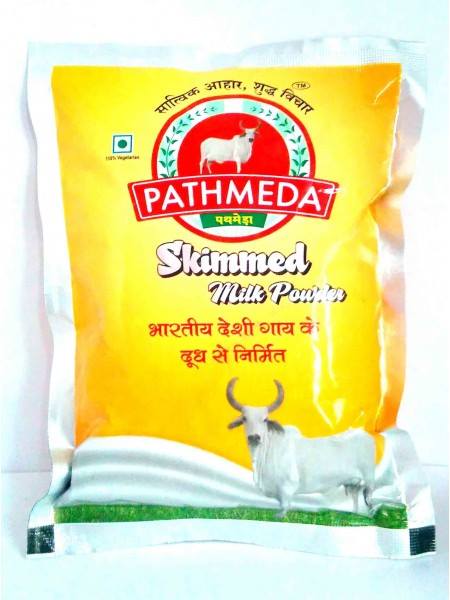 Packet of Pathmeda skimmed milk powder with cow illustration