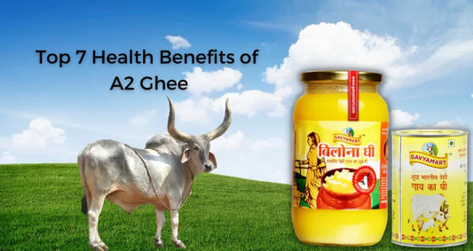 A2 ghee products with a cow in a green field and blue sky