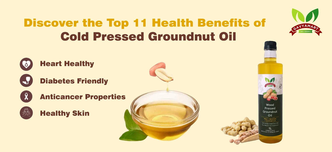 Bottle of cold pressed groundnut oil next to a bowl of oil and peanuts